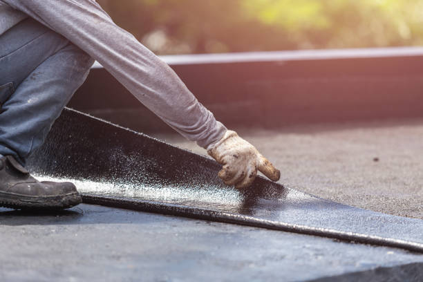 Professional Basement Waterproofing technician working in Lakeview, MI
